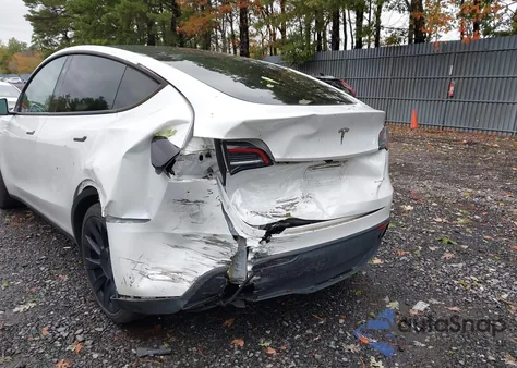 2023 Tesla Model Y Awd/Long Range Dual Motor All-Wheel Drive z USA, uszkodzony, nr VIN 7SAYGDEE6PA164777